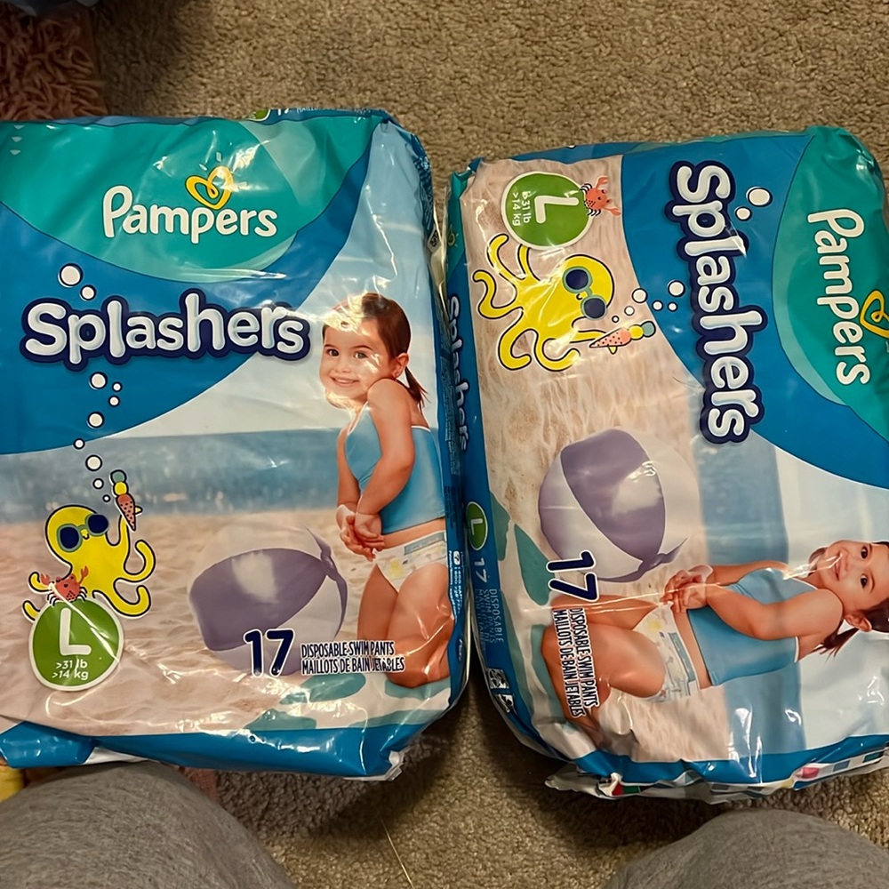 2 BRAND NEW packages of pampers,splashers